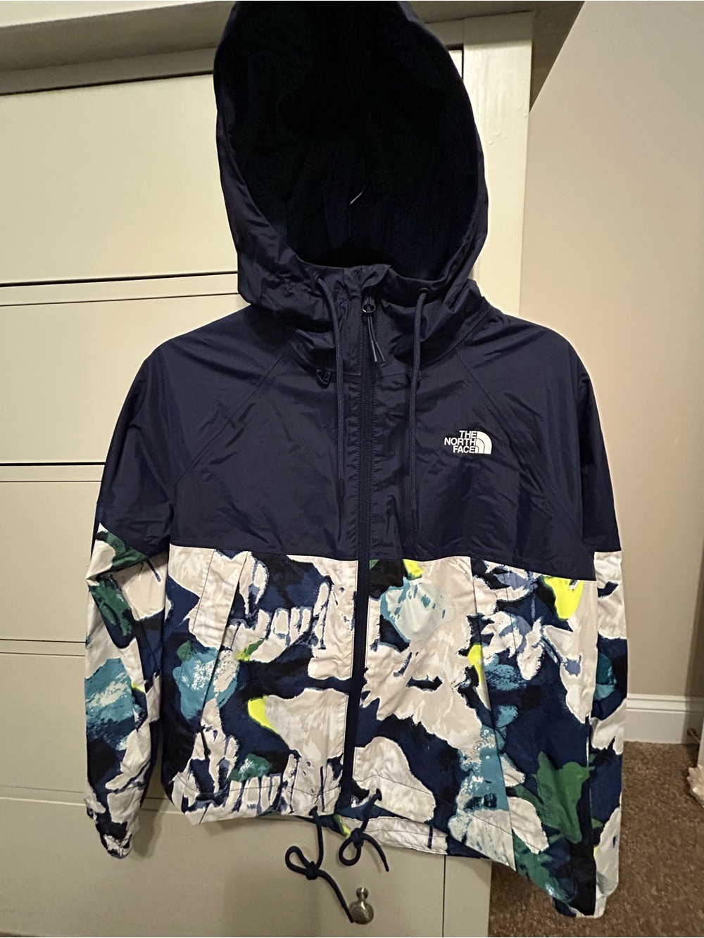 The North Face Antora Hooded Raincoat in Navy with Abstract Floral Print